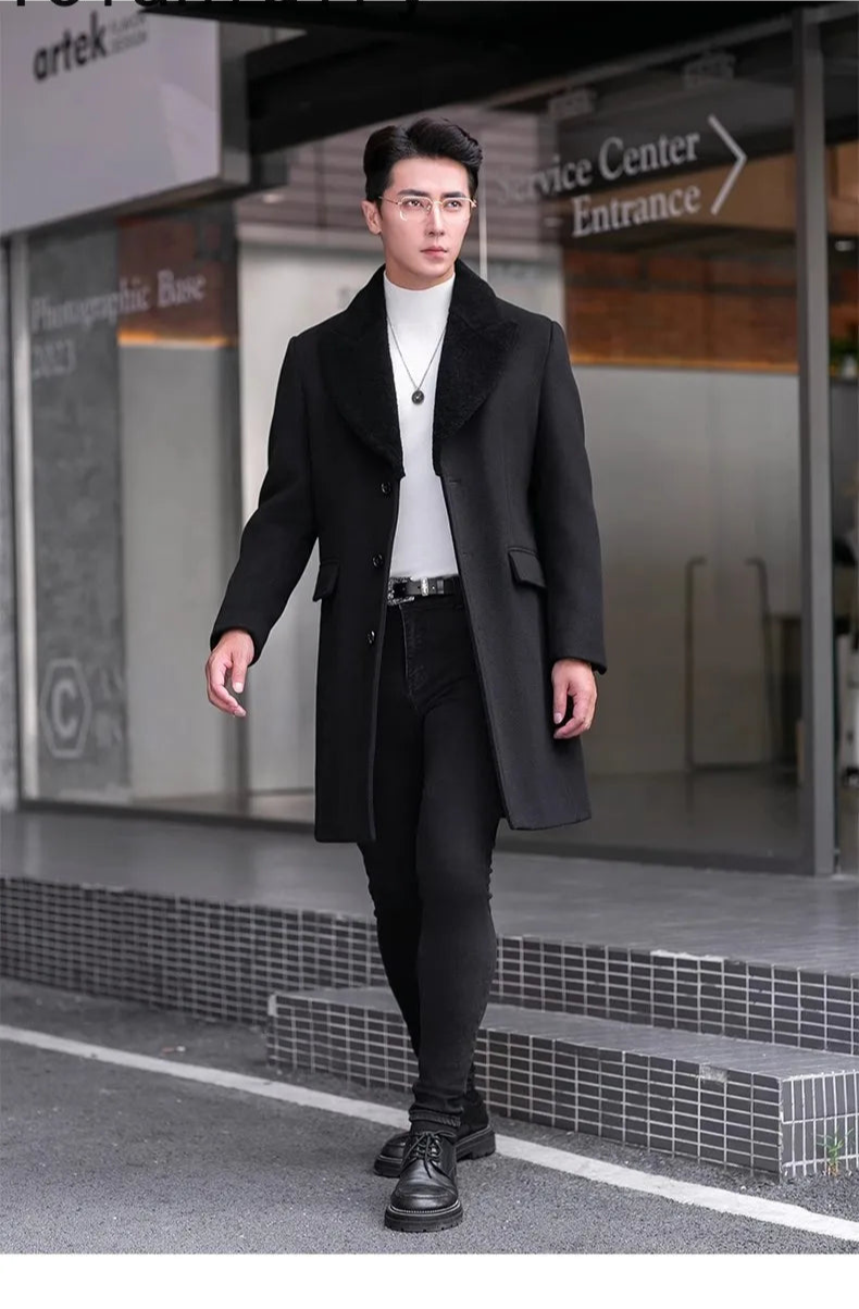 Men’s wool-cashmere coat with shearling peaked lapels in Onyx, model stepping forward confidently. From Borcelleclothes.