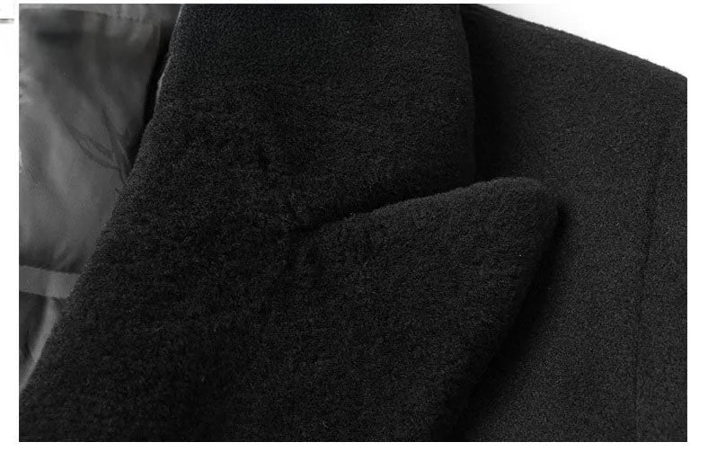Men’s wool-cashmere coat with shearling peaked lapels in Onyx, close-up of the right shearling lapel. From Borcelleclothes.