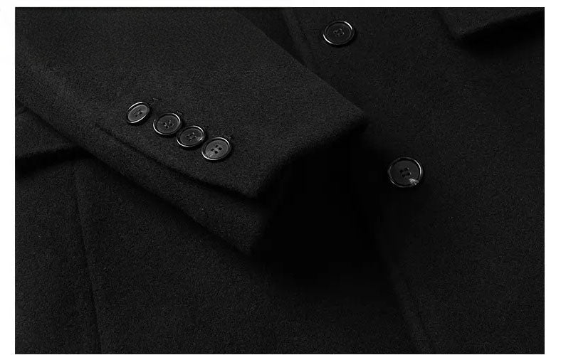 Men’s wool-cashmere coat with shearling peaked lapels in Onyx, close-up of sleeve placket with buttons. From Borcelleclothes.