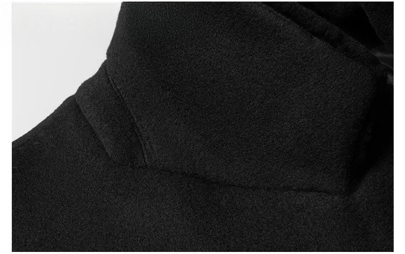 Men’s wool-cashmere coat with shearling peaked lapels in Onyx, close-up of the wool undercollar. From Borcelleclothes.