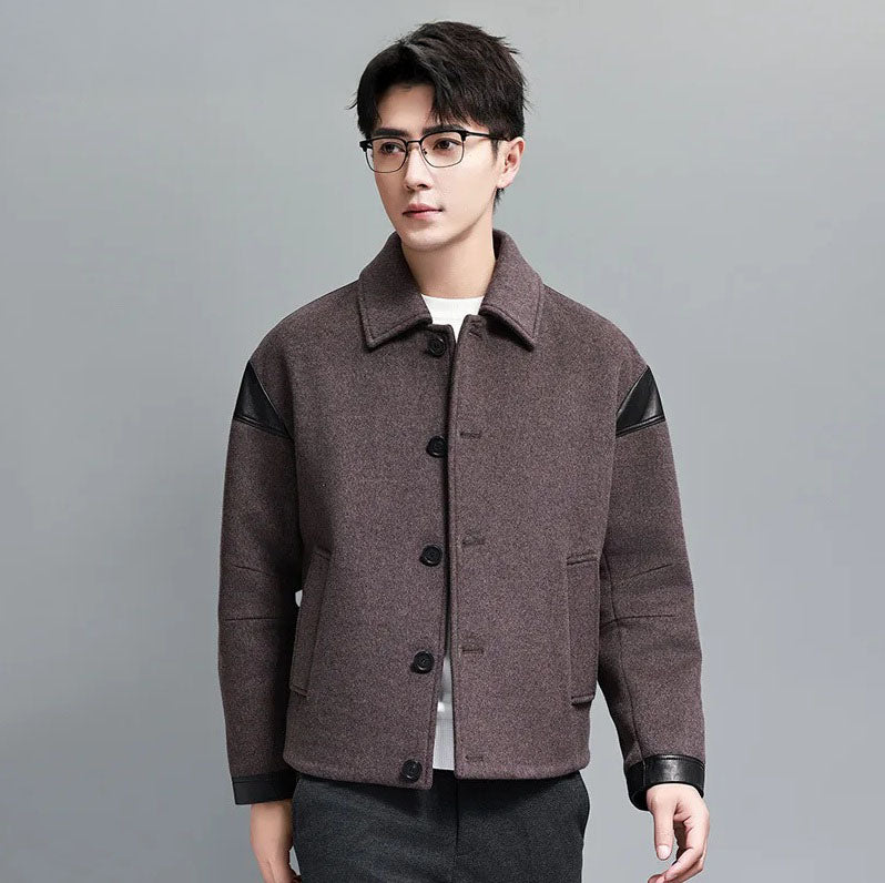 Model watching to the side in men's wool-cashmere jacket with leather traces – From Borcelleclothes.