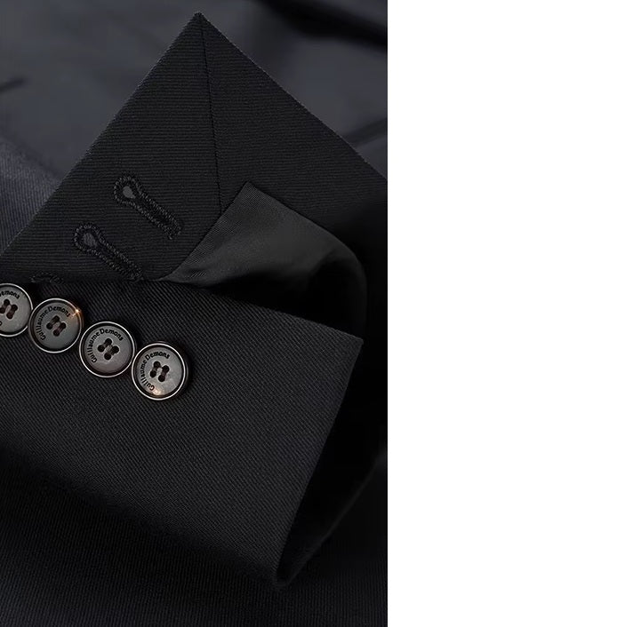 The unfastened decorative sleeve placket on the blazer of the Borcelleclothes Men's Wool and Silk Blend Suit in Onyx Texture, highlighting the four-button detail.