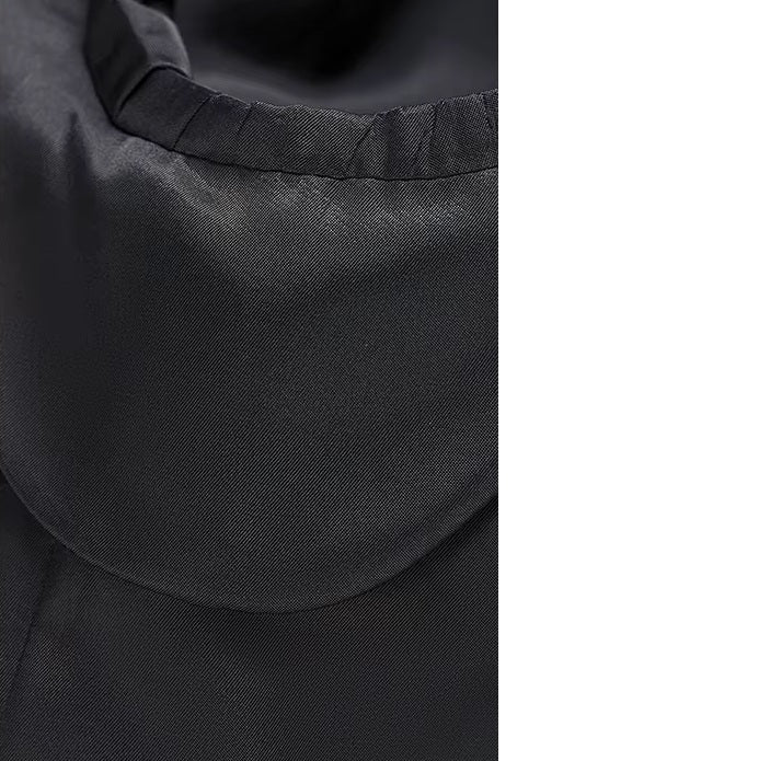 Interior view of the blazer from the Borcelleclothes Men's Wool and Silk Blend Suit in Onyx Texture, highlighting the thoughtfully designed lining pocket.