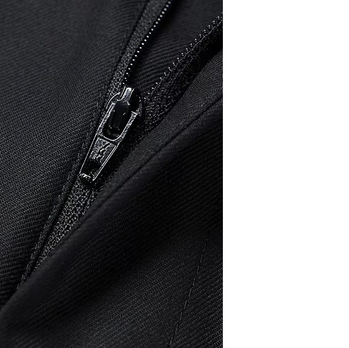 The zipper fly on the pants of the Borcelleclothes Men's Wool and Silk Blend Suit in Onyx Texture, emphasizing quality craftsmanship.