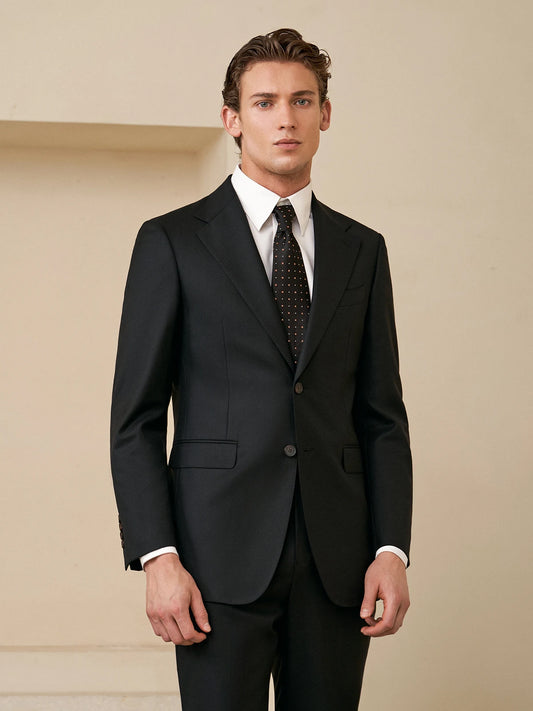Borcelleclothes Men's Wool and Silk Blend Suit in Onyx, featuring a tailored single-breasted blazer with notch lapels, rounded front bottoms, and a streamlined silhouette paired with slim-fit trousers for a refined and contemporary look.