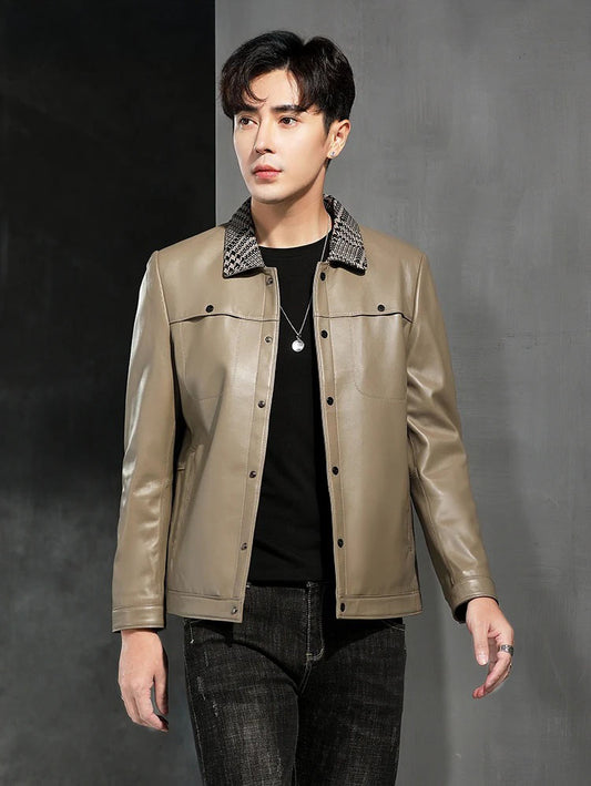 Men's Woven-collar sheepskin jacket in Shadow; double-placket snap front; snap-entry chest pockets; single-welt waist pockets; banded hem; snap cuffs — From Borcelleclothes.