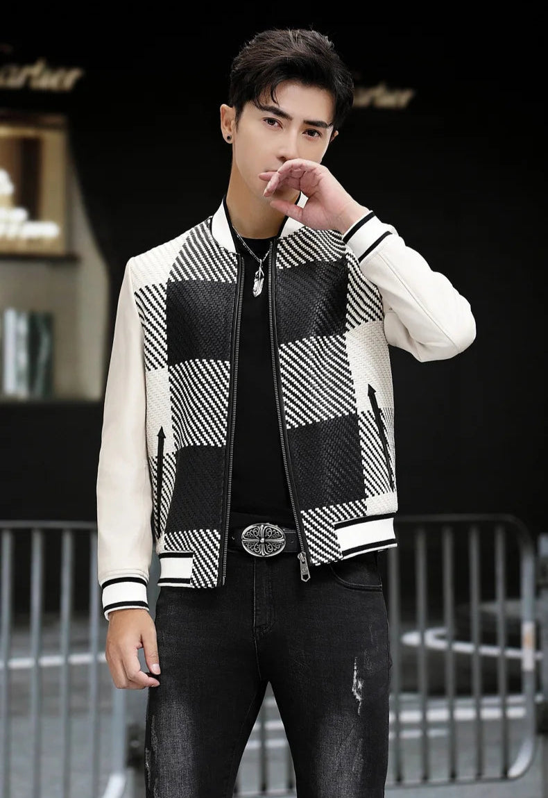 Model touching lips; woven-leather plaid jacket (Platinum & Onyx) — From Borcelleclothes.