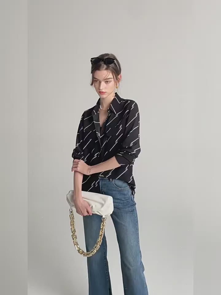 Video showcasing a Women's Mulberry Silk Shirt with Black and White Diagonal Stripes. From Borcellelothes.
