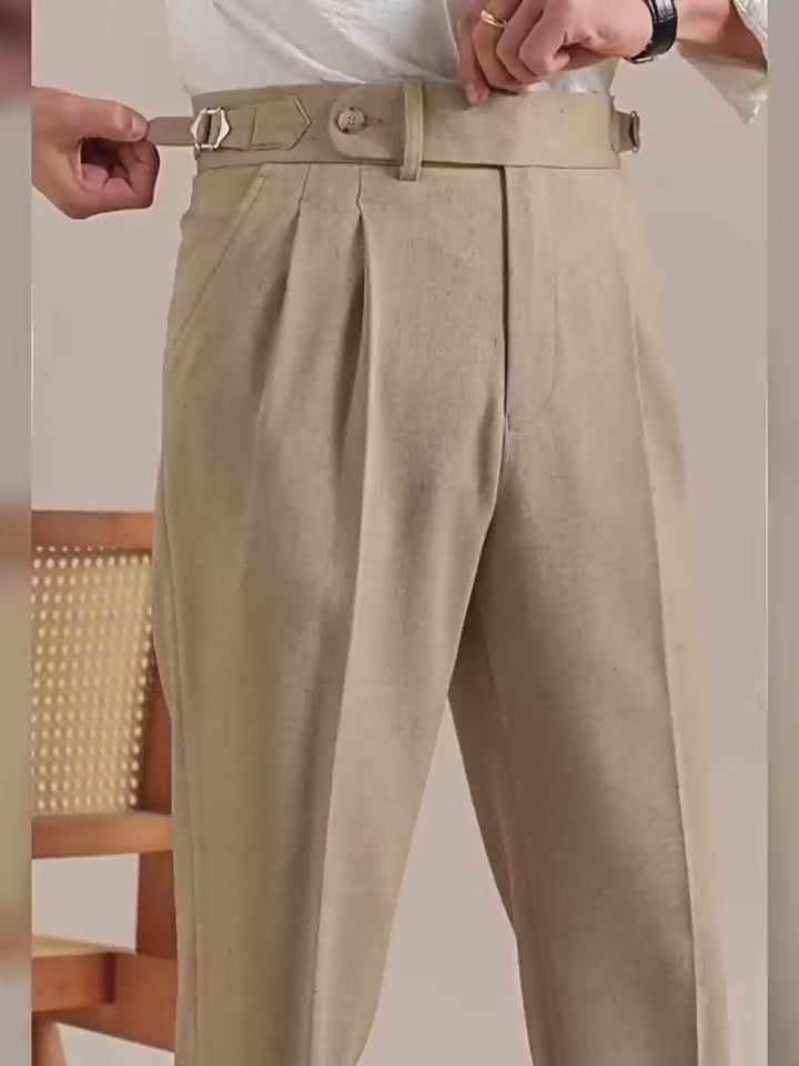 Video showcasing the Men’s cropped trousers in Nobel and Sandrift — featuring side adjusters, clean front, and cuffed hem. A structured silhouette without the need for a belt. From Borcelleclothes.