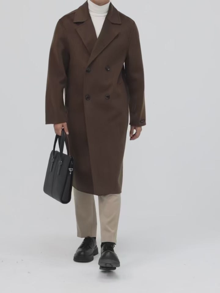 Video showcasing a Men’s double-faced wool coat in Espresso with notch lapels, double-breasted front, and hand-finished seams—crafted for quiet strength and lasting warmth. From Borcelleclothes.