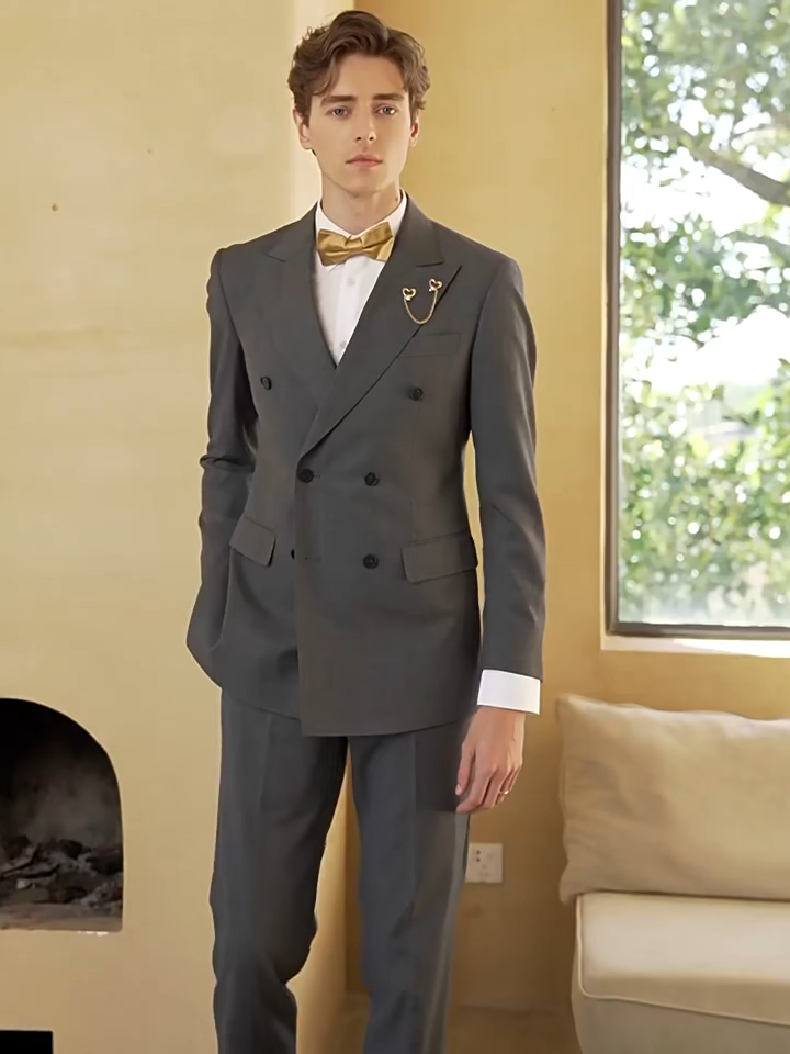 Video showcasing a Men’s three-piece suit in Davy Grey with double-breasted blazer and peaked lapels — a soft, structured take on modern formality. From Borcelleclothes.
