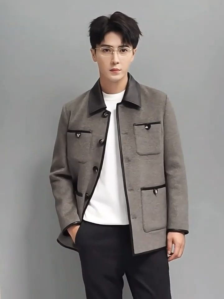 Video showcasing a Men’s minimalist motif wool-cashmere coat in Dawn, with leather collar, horn buttons, and four symmetrically placed pockets — from Borcelleclothes.