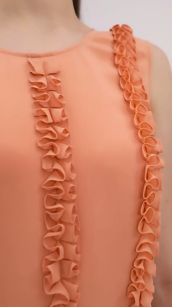 Video showcasing a Women's mulberry silk dress in Folklore Rose shade, featuring gathered ribbon details and  made from luxurious 30 Momme silk. From Borcelleclothes.