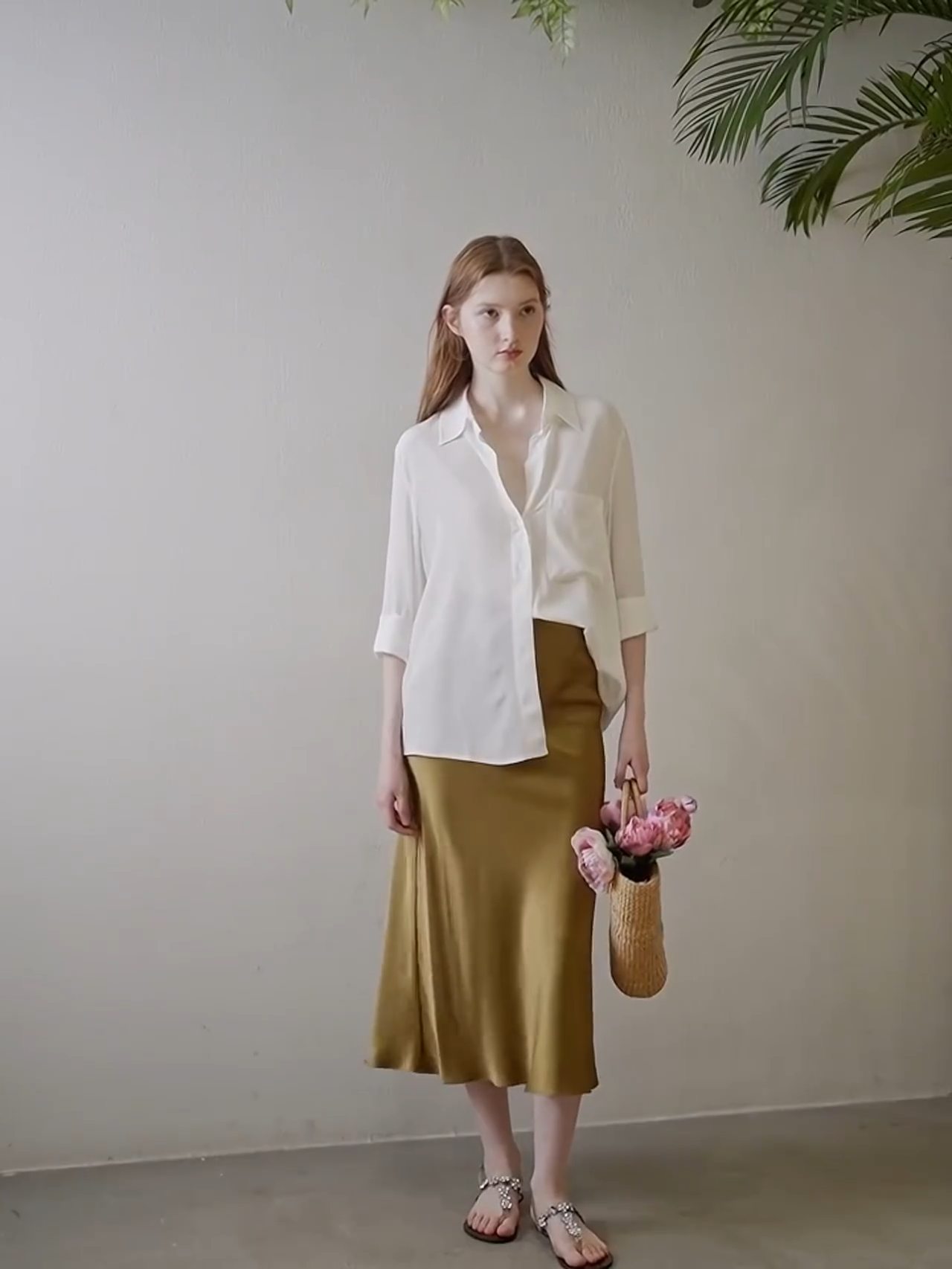 Video showcasing a Women's mid-length A-line silk skirt in Himalaya tone with ribbed waistline and invisible side zipper, crafted from 22 Momme Mulberry silk. From Borcelleclothes.