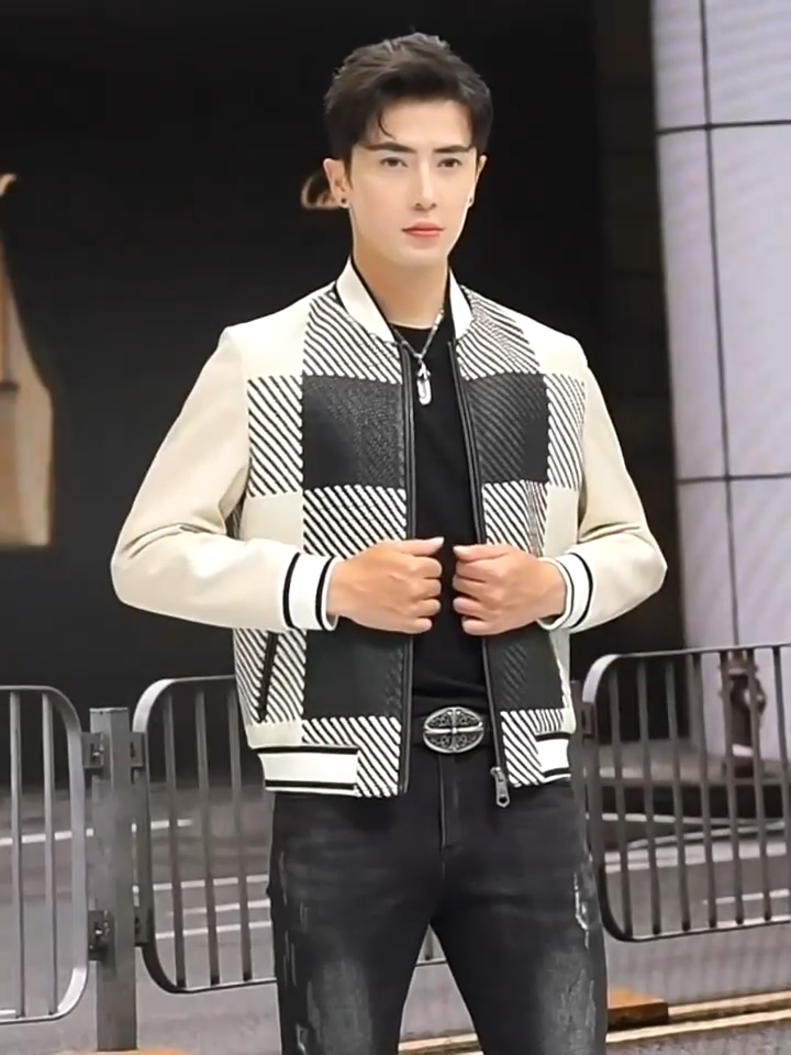 Video showcasing a Men's Woven-leather plaid sheepskin jacket in Platinum & Onyx; metal zip; smooth sleeves; double-trim slit waist pockets; rib-knit collar, cuffs and hem — From Borcelleclothes.
