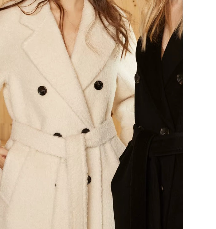 Models wearing the Women’s Mid-Calf Alpaca Coat in Orchid White and Onyx, showcasing the double-breasted design, plush texture, and belted silhouette crafted from Suri alpaca and cashmere. From Borcelleclothes.