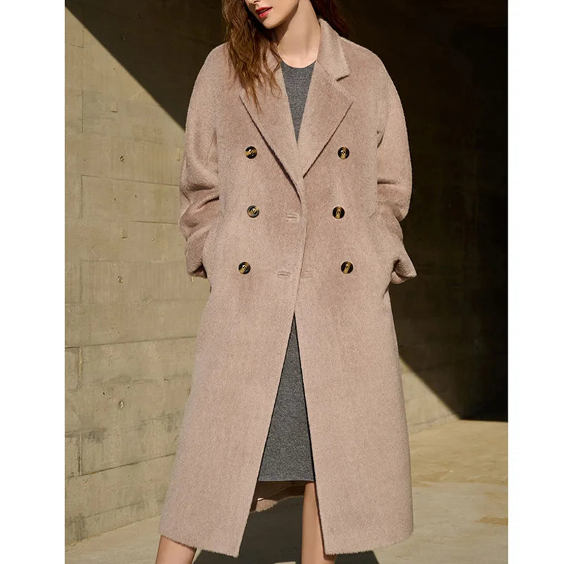 Women's Mid-Calf Alpaca Coat in Quicksand, showcasing the elegant double-breasted design, seamless kimono sleeves, and luxurious Suri alpaca and cashmere blend with a soft fur-like texture. From Borcelleclothes.