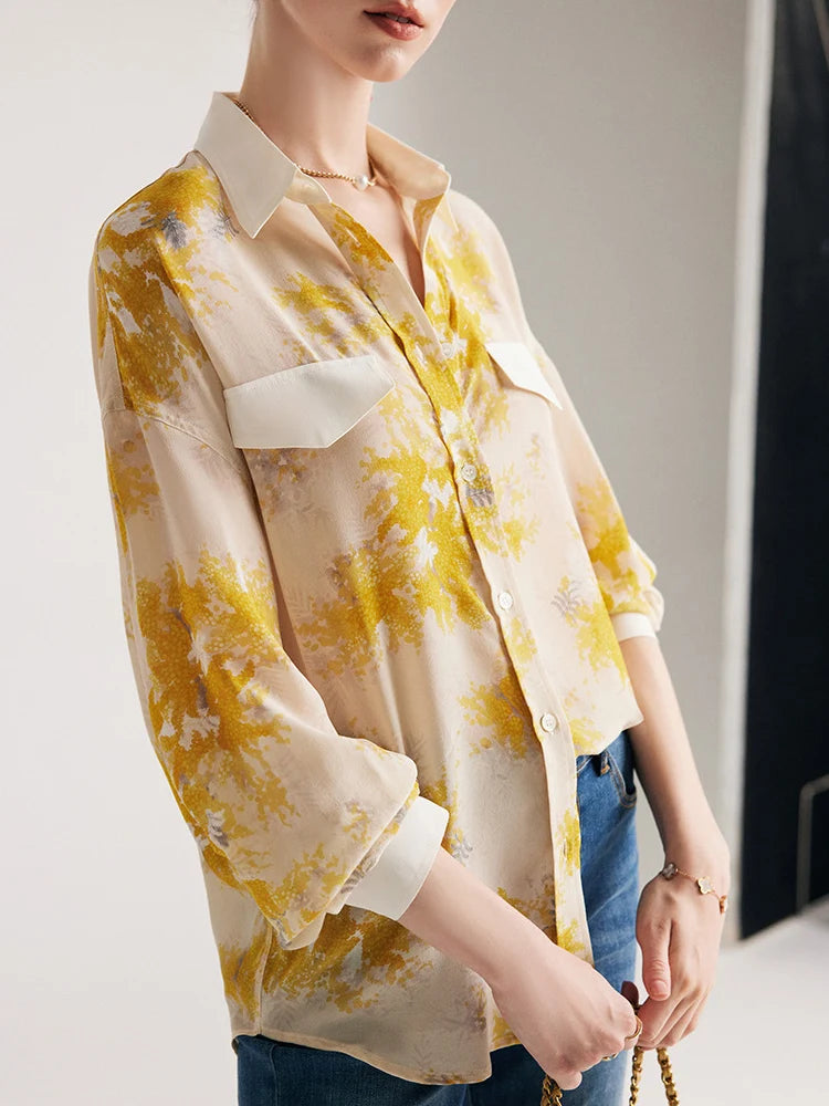 Model turned to the side, showcasing women's 100% Mulberry Silk Mimosa Print Shirt. From Borcelleclothes.