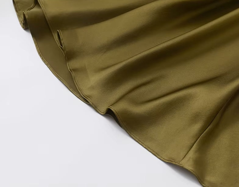Bottom view of the silk skirt in Himalaya, highlighting fluid movement and mid-length hem. From Borcelleclothes.