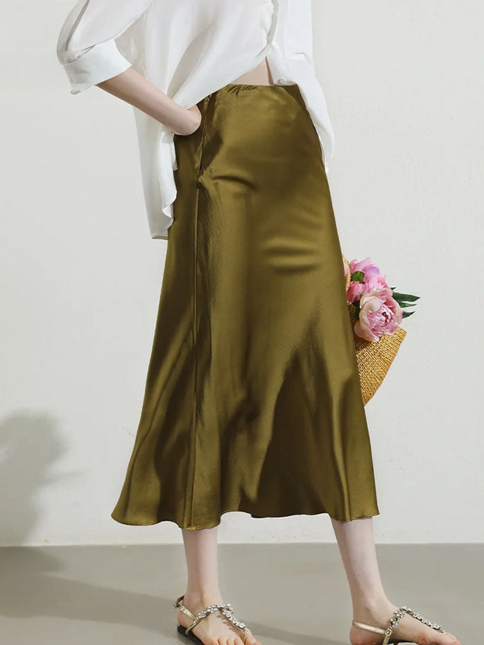 Model stepping to the side in Himalaya silk skirt, revealing graceful motion and light structure. From Borcelleclothes.