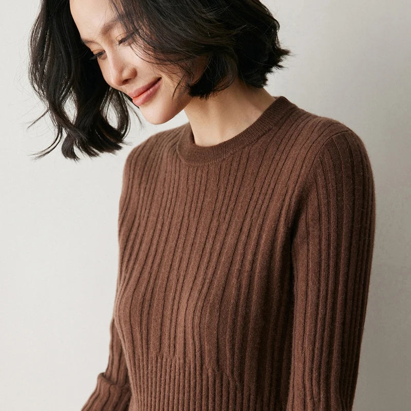 Smiling model in Café Noir abstract-striped cashmere sweater with tilted head — From Borcelleclothes.