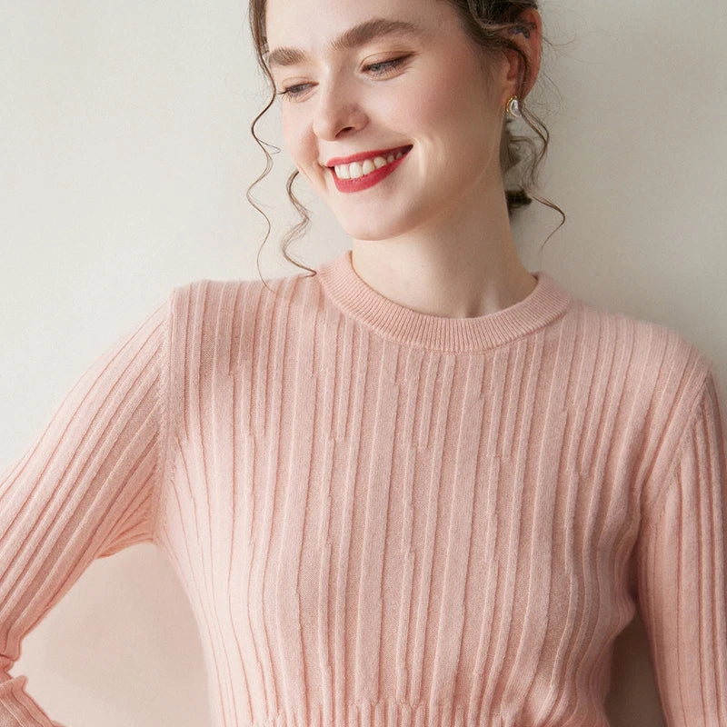 Women’s abstract-striped cashmere sweater in Pastel Pink, with soft vertical textures and wide ribbed waistline — From Borcelleclothes.