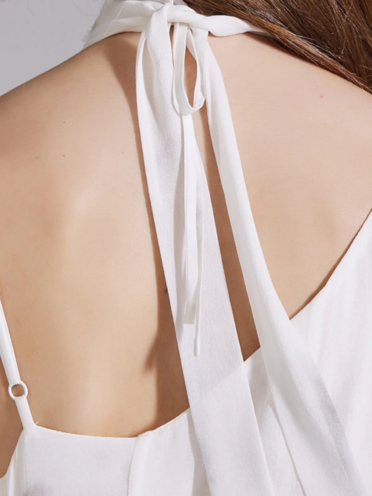 Back upper part of the dress, showing the delicate drape and clean shoulder line. From Borcelleclothes.