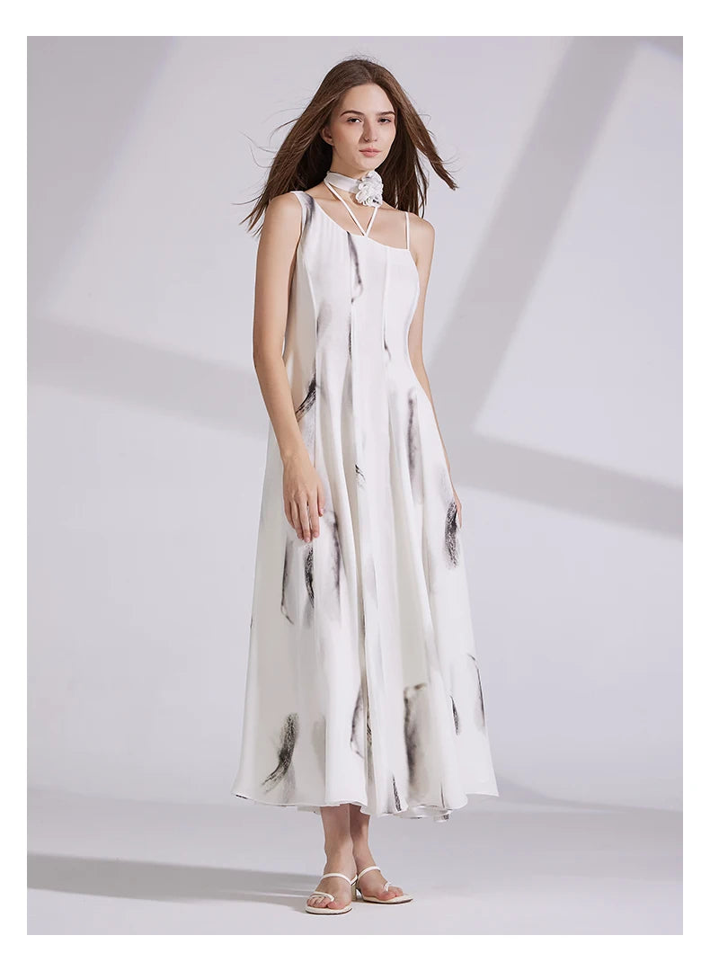 Model steps forward in platinum silk dress, capturing the motion of the flared hem. From Borcelleclothes.