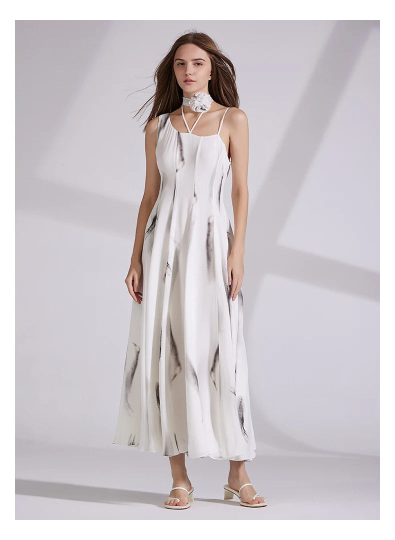 Women's asymmetrical silk georgette dress in platinum with artistic monochrome brushstrokes, featuring a one-shoulder neckline, neck flower accent, and subtle flared panel construction. From Borcelleclothes.