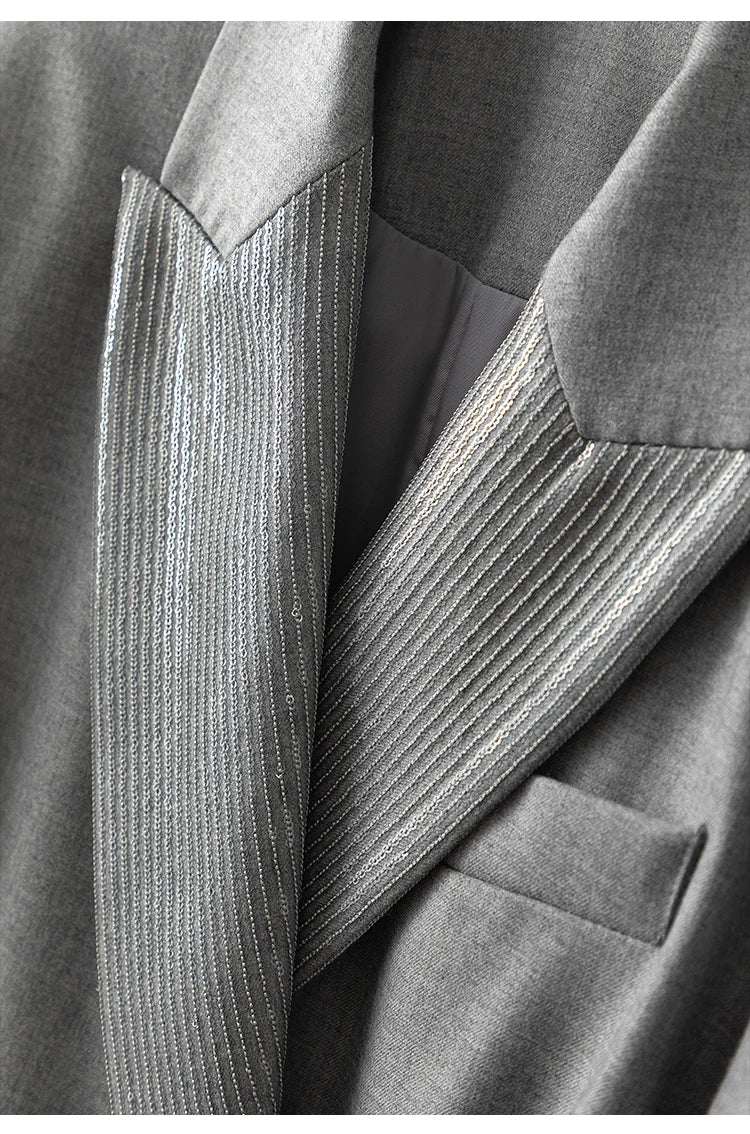 Close-up of peaked lapels with chain detail on women’s Australian wool blazer in Mountain Mist. From Borcelleclothes.