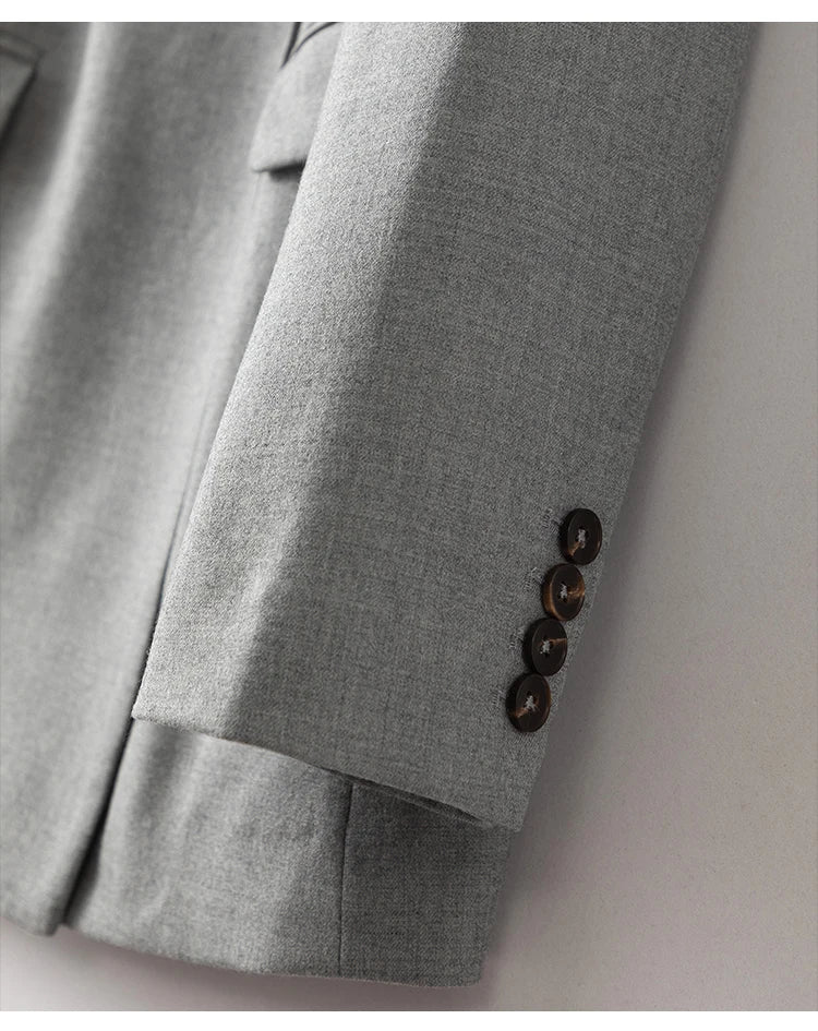 Detail of sleeve placket with horn buttons on women’s Australian wool blazer in Mountain Mist. From Borcelleclothes.