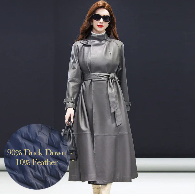 Women's Avant-Garde Wrap Coat in Monsoon (Down Version). Model wears the sculptural leather wrap coat, belted at the waist, with a bold high collar and structured drape. Borcelleclothes.