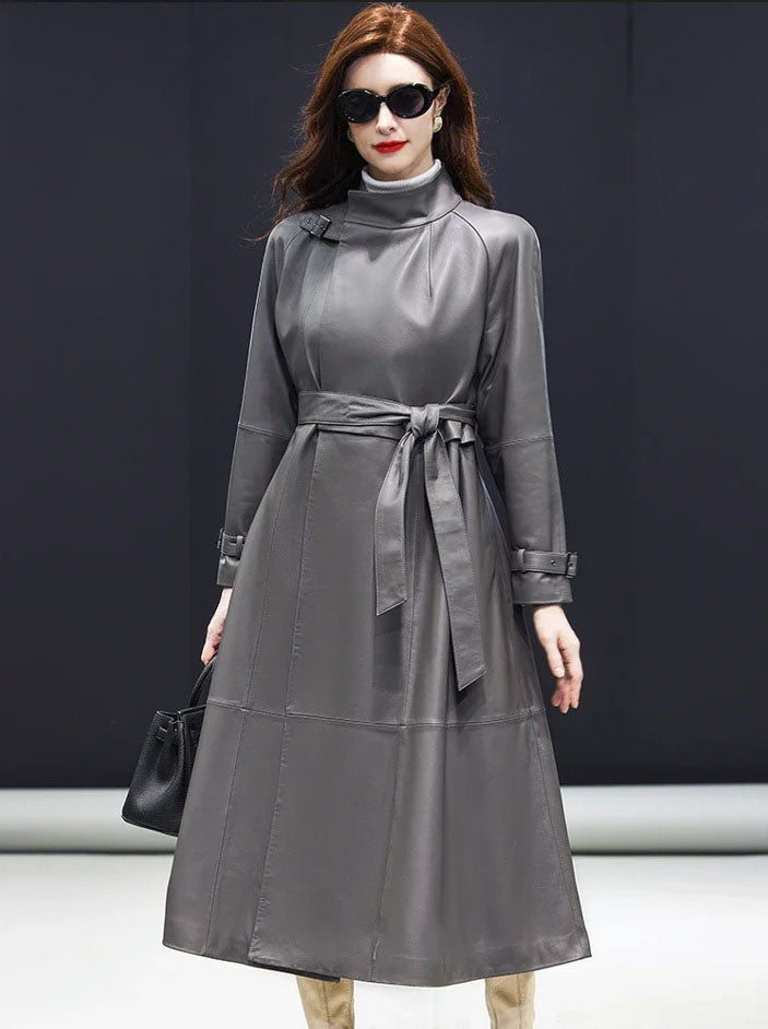 Women's Avant-Garde Wrap Coat in Monsoon. Model stands with arms straight, showcasing the refined proportions and precise tailoring. Borcelleclothes.