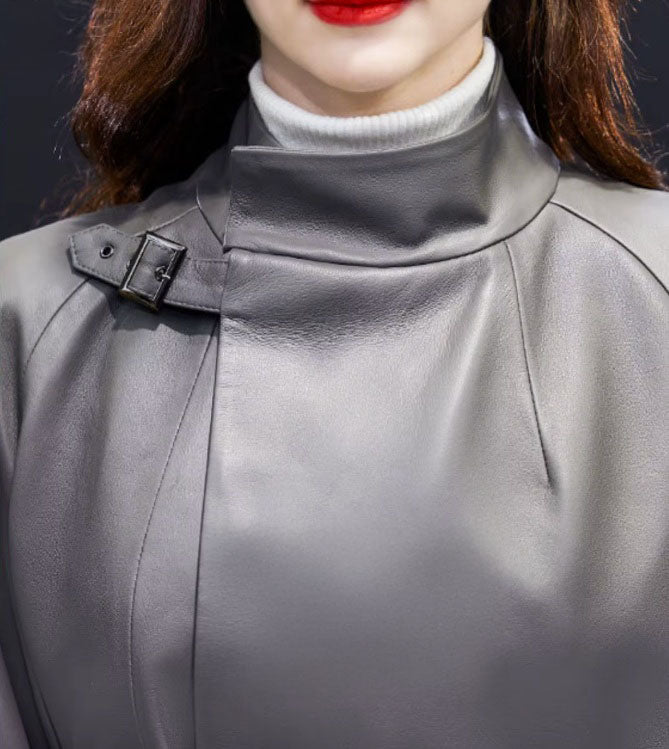 Women's Avant-Garde Wrap Coat in Monsoon. Close-up of the structured high collar, sculpted for a bold and refined presence. Borcelleclothes.