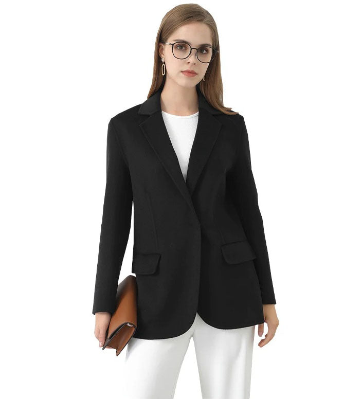 Women's double-sided baby cashmere blazer in Onyx with notch lapels, concealed front, and flap pockets. From Borcelleclothes.
