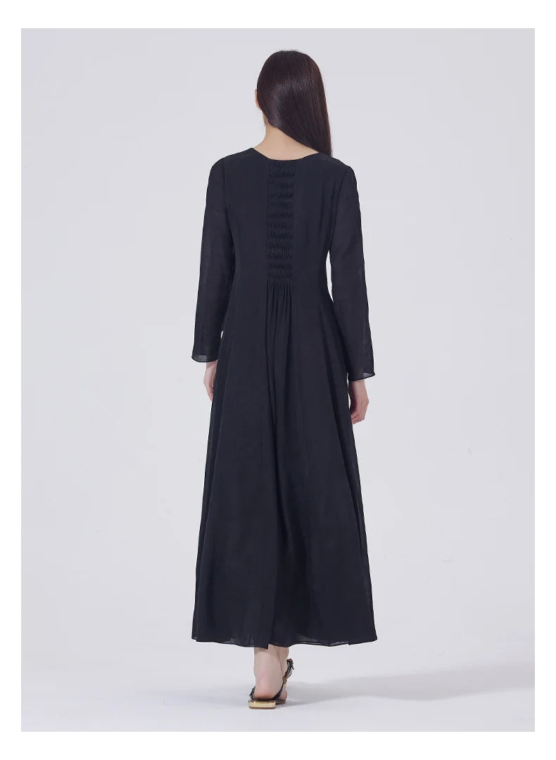 Full back view of the Baltic Sea silk dress, featuring inset pleats and flowing volume. From Borcelleclothes.