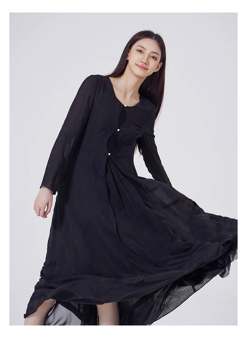 Model demonstrating the flowing hem of the Baltic Sea silk jacquard dress. From Borcelleclothes.