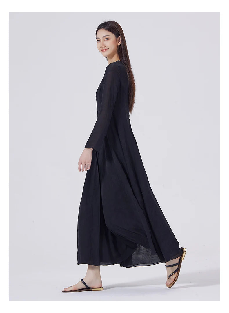 Side view of the women's Baltic Sea silk dress, revealing soft drape and sleeve structure. From Borcelleclothes.