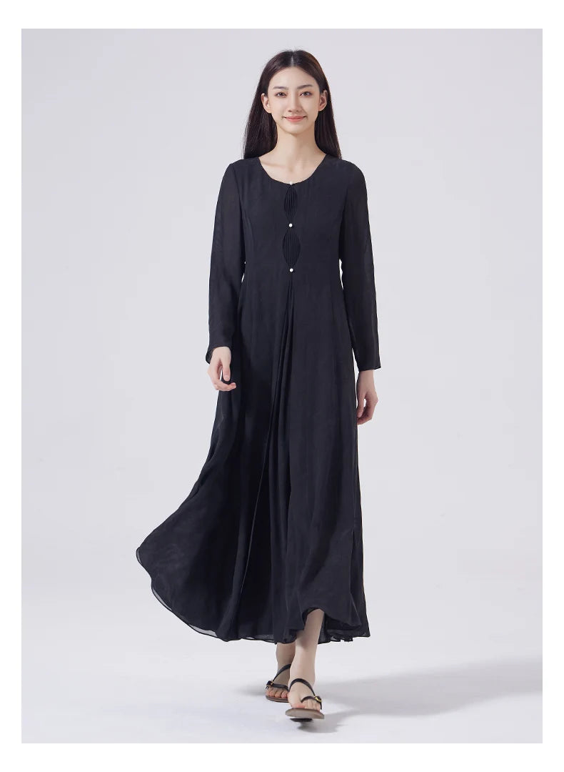 Model stepping forward in the Baltic Sea silk jacquard dress, skirt in motion. From Borcelleclothes.