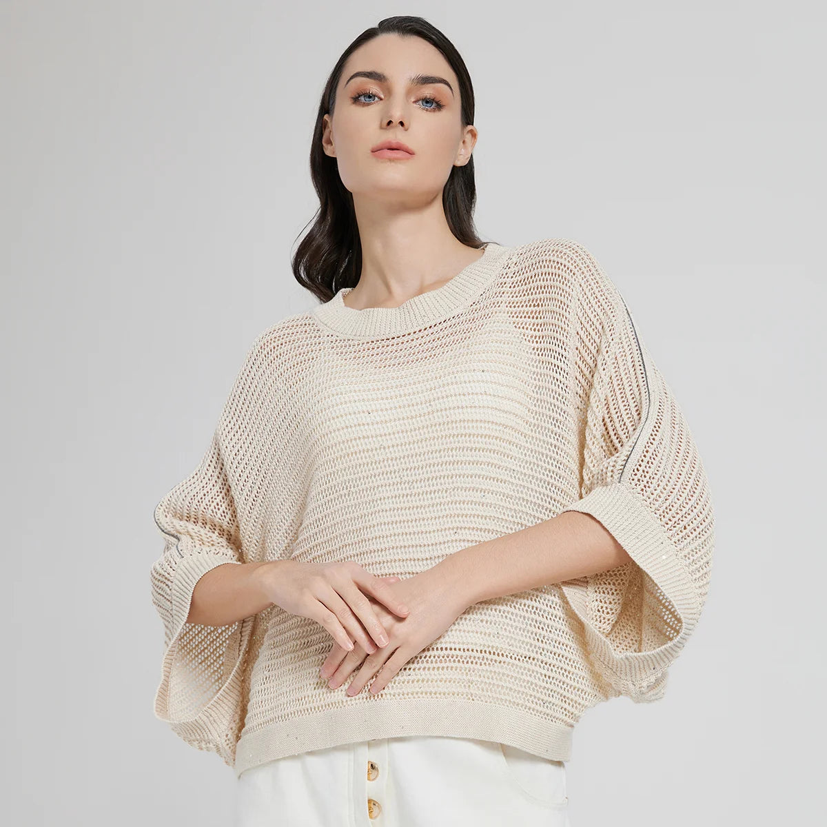 Women's batwing linen mesh top in Spring Wood, featuring openwork knit and wide ribbed trims, styled with soft natural light. From Borcelleclothes.
