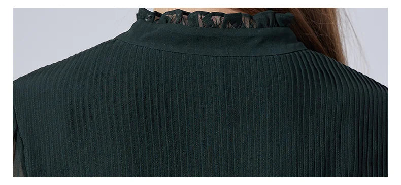 Detailed view of vertical pintucks on the back bodice of the Lunar Green dress. From Borcelleclothes.