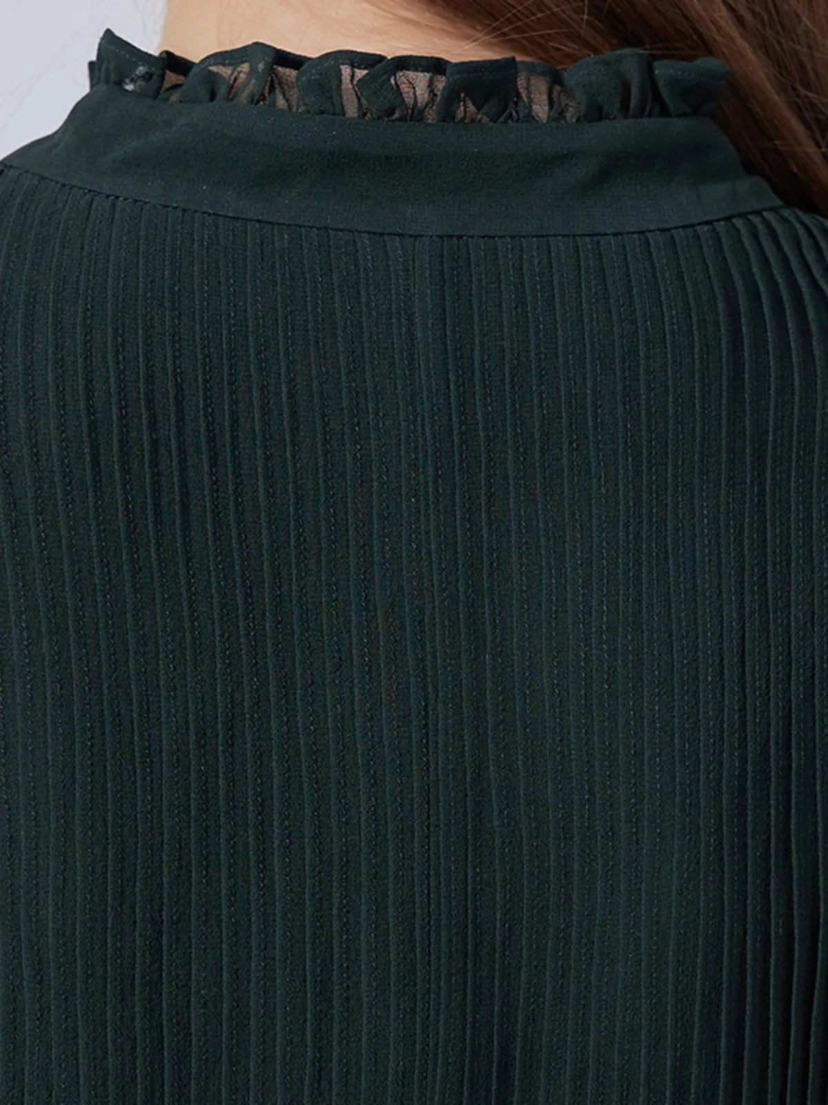 Upper back view of the Lunar Green dress with vertical pintucks. From Borcelleclothes.