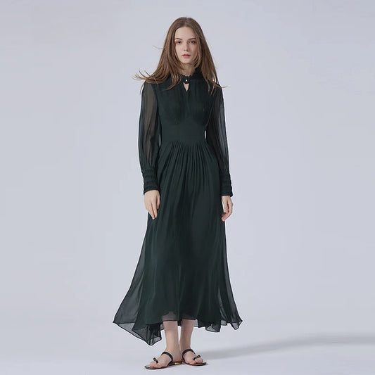Women's Lunar Green silk chiffon dress with bra-inspired pintucks, curved gathered waist, and tall shirt cuffs — a refined silhouette blending structure and softness. From Borcelleclothes.