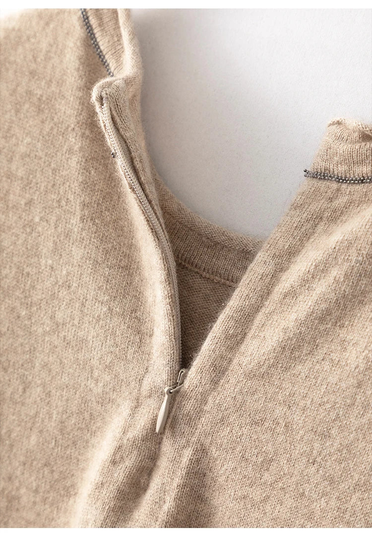 Back neckline of Dark Vanilla dress with partially unzipped closure — From Borcelleclothes.