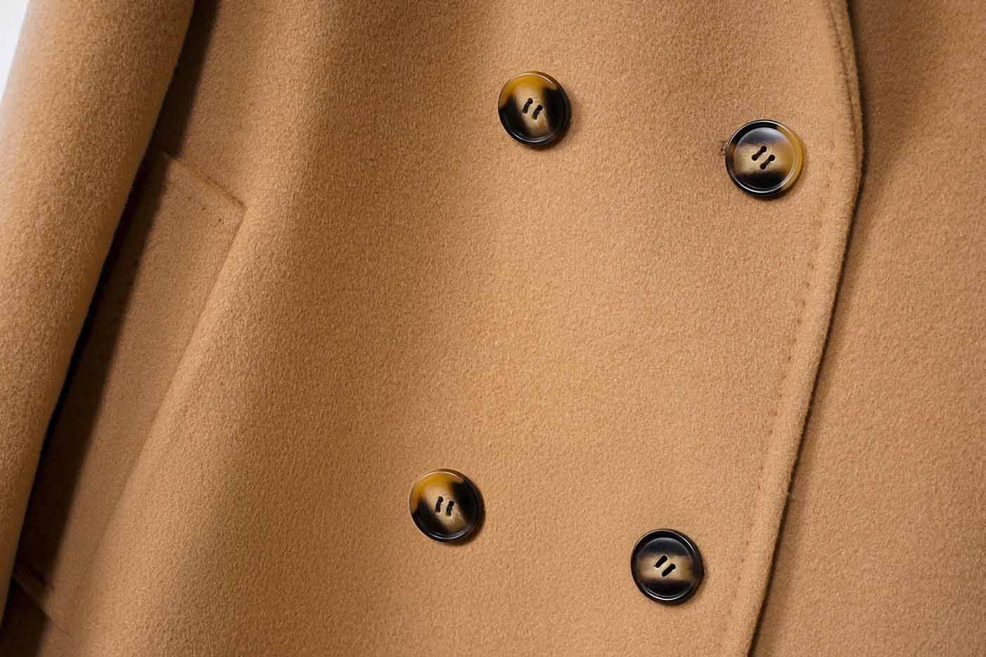 Focus on the four central buttons of the Women's Cashmere Blend Long Coat in Clay Brown, highlighting the clean and structured design. From Borcelleclothes.
