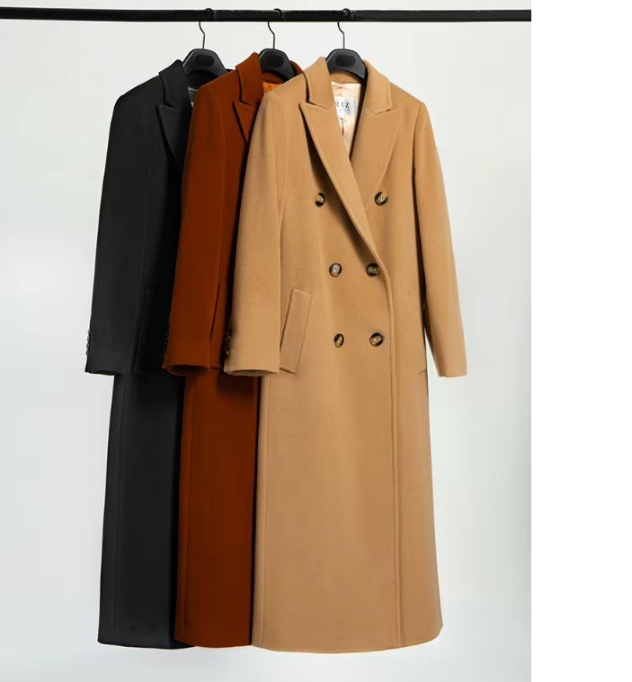 Women's Cashmere Blend Long Coats displayed on hangers in Onyx, Clay Brown, and Rust Brown, showcasing their luxurious fabric and versatile hues. From Borcelleclothes.
