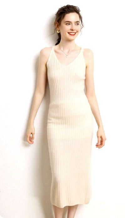 Elegant Women's Slimming Midi Dress in Merino, crafted from luxurious cashmere wool with a ribbed texture and figure-enhancing V-necklines on the front and back. From Borcelleclothes.