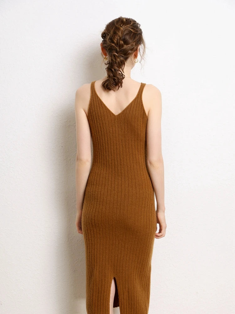 The back view of an Elegant Women's Slimming Midi Dress in Sienna, crafted from luxurious cashmere wool with a ribbed texture and figure-enhancing V-necklines on the front and back. From Borcelleclothes.