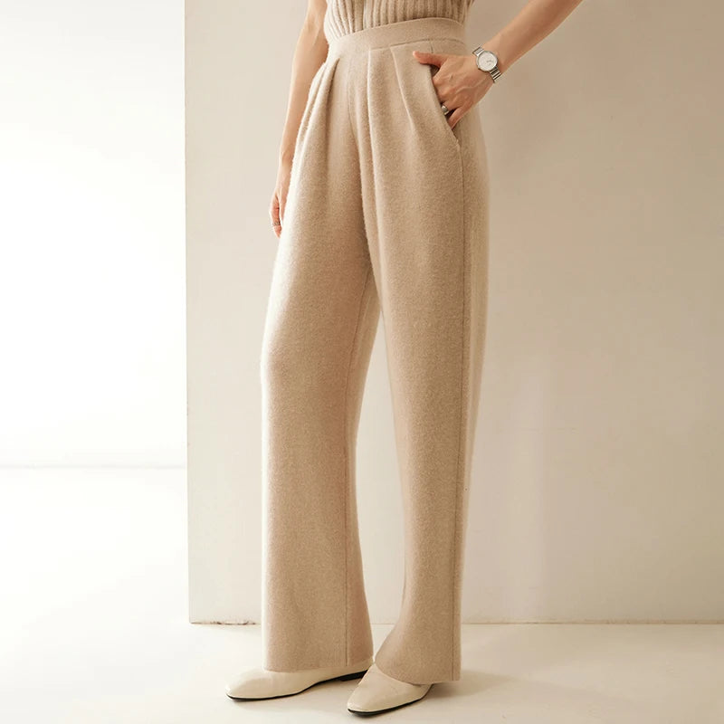 Women's Cashmere Pleated Trousers in Pale Taupe, with four front pleats and a structured waistband — From Borcelleclothes.