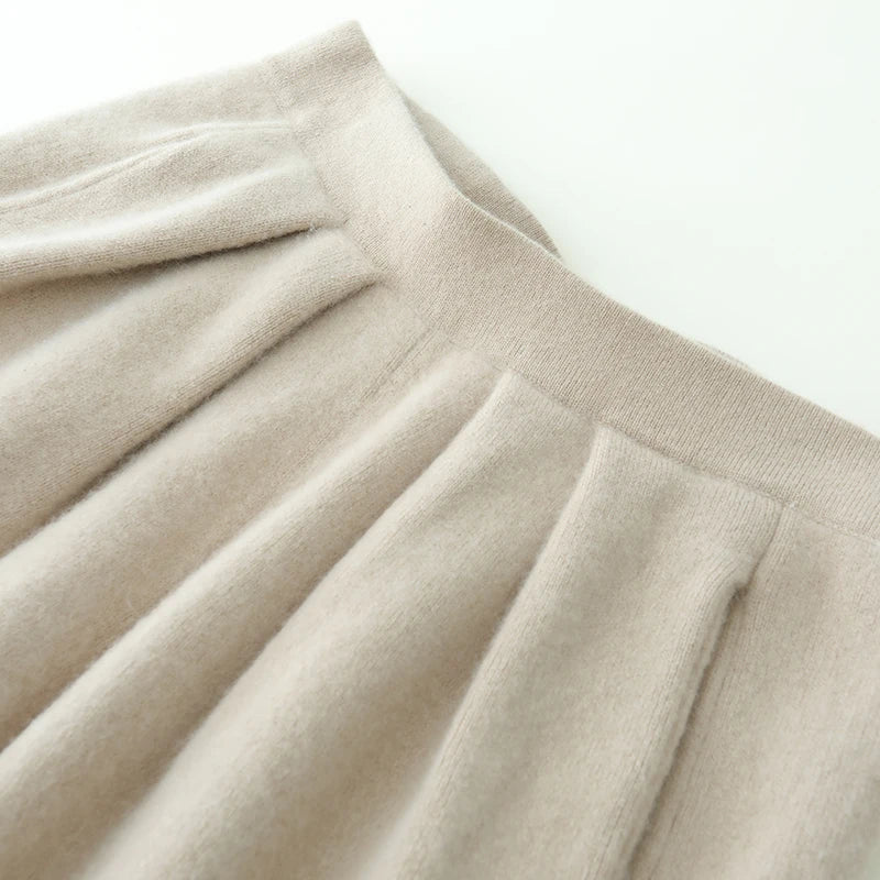 Upper section of Soft Amber pleated cashmere trousers showing waistband and pleats — From Borcelleclothes.